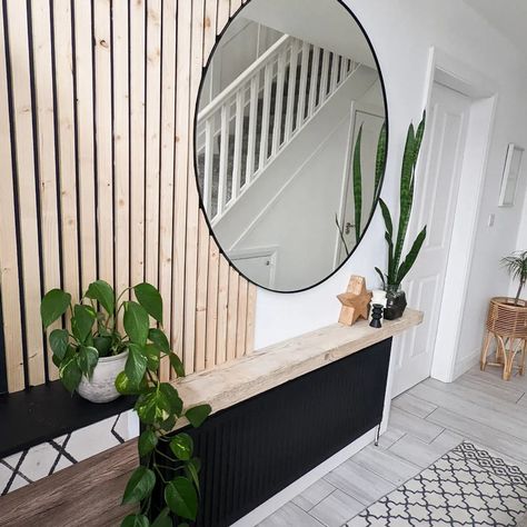 A MUM shared how she saved hundreds by installing a stunning slatted feature in her hallway for just £50 with B&Q products. Tanya O’kane, 47, was originally quoted hundreds for a builder to install the on-trend feature but she didn’t want to spend that much. So she took matters into her own hands, quite literally, […] Wall Slats Hallway, Wooden Slat Wall Hallway, Wooden Slat Hallway, Slat Wall Hallway, Slatted Wall Hallway, End Of Hallway Mirror Ideas, Small Hallway Inspiration, Hallway Feature Wall, Round Mirror Living Room