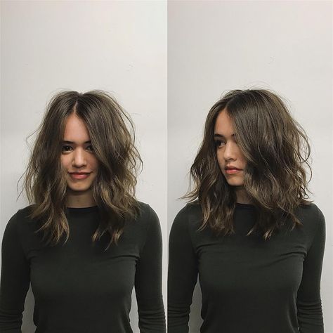 This Brunette Layered Cut with Messy Wavy Texture and Center Part is a great cut for someone seeking fashionable versatility. This layered shoulder length cut can be styled sleek and straight, with textured waves or curls, or with a simple blowout for body and movement. It is also long enough to create updos and braids. Styling tips for this long bob and other similar medium length haircuts, lobs, and hair color ideas can be found at Hairstyleology.com Velcro Rollers, Layered Cut, Center Part, Medium Length Hair With Layers, Medium Length Hair Men, Mid Length Hair, Modern Hairstyles, Medium Hair Cuts, Layered Cuts