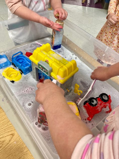 Washing cars has never been more fun! Some water, and recycled foam soap pumps with dish soap, and a couple of toothbrushes make a great car wash for our toy cars. We have a Fisher Price car wash that we like to put in the bin, too. This provided all morning entertainment forour class of three year olds! Diy Car Wash For Kids, Car Wash Sensory Bin, Car Wash Station, Outdoor Eyfs, Toy Car Wash, Diy Car Wash, Preschool Transportation, Transportation Theme Preschool, Transportation Preschool