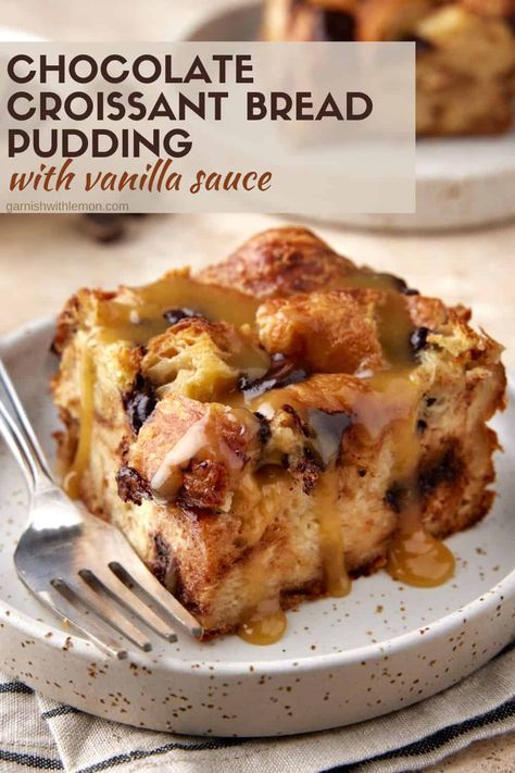 Buttery, flaky pastries make this easy, make-ahead Chocolate Croissant Bread Pudding with Vanilla Sauce stand out from the rest! Toasted croissant pieces are baked in a fragrant custard sauce, dotted with rich chocolate chunks and drizzled with a warm vanilla butter sauce for the ultimate comfort food dessert recipe. Chocolate Croissant Bread Pudding Recipe, Bread Pudding Cookies, Bread And Butter Pudding With Croissants, Crossaint Bread Pudding Desserts, Bread Pudding Chocolate, Croissant Bread And Butter Pudding, Chocolate Bread Pudding Recipe Best, Bread Pudding Croissant, Bread Pudding Savory