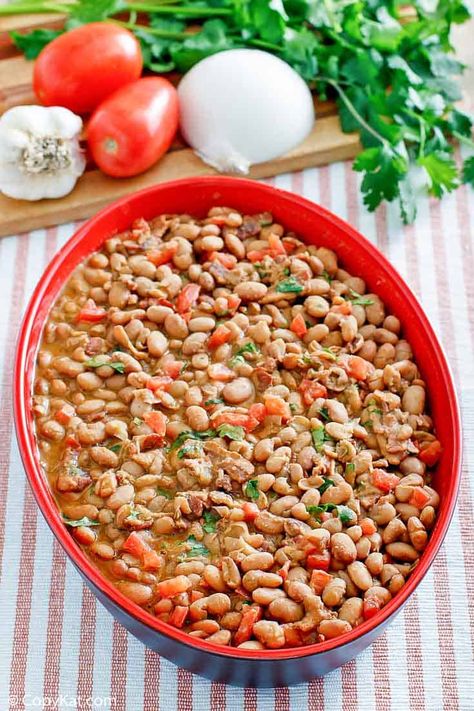 Learn how to make Pappasitos Frijoles a la Charra with this easy copycat stovetop recipe. These homemade charro beans are slow simmered pinto beans with bacon, onion, garlic, tomatoes, and Mexican seasonings. They are also called cowboy beans and a great side dish for burritos, tacos, enchiladas, and Tex-Mex grilled meats. #beans #mexicanfood #texmexrecipes #copycat #copycatrecipes Copycat Pappasitos Recipes, Pappasitos Recipes, Pinto Beans Stove Top, Mexican Pinto Beans, Charro Beans, Canadian Recipes, Beans With Bacon, Pinto Bean Recipes, Famous Recipes