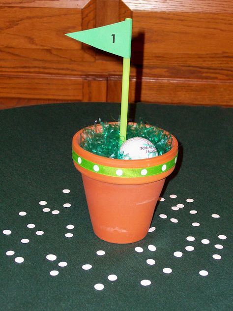 centerpieces with golf balls | Each pot will be accompanied by "golf ball" confetti. Party Decorations Centerpieces, Golf Centerpieces, Centerpiece Tutorial, Golf Theme Party, Golf Birthday Gifts, Golf Ball Gift, Golf Party Decorations, Golf Ball Crafts, Sports Party Decorations