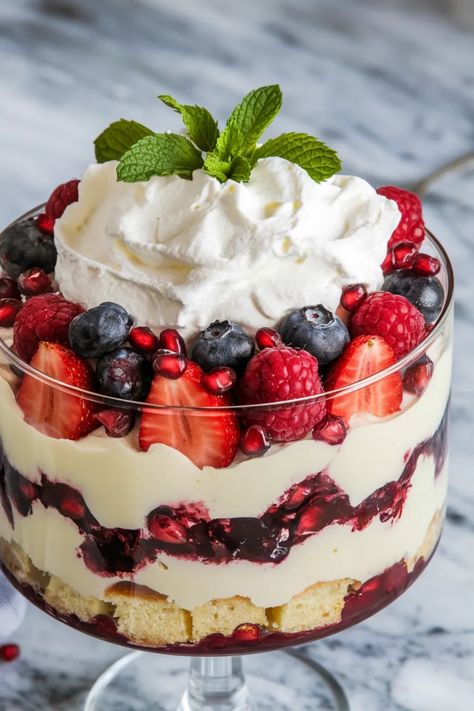 A photo of a  Berry New Year’s Trifle a New Years Dessert ideas Happy New Year Desserts, Winter Time Desserts, New Year Party Desserts, Holiday Parfait Desserts, New Years Food Ideas Desserts, Dessert Recipes New Years, New Year Sweets Ideas, New Years Trifle, Ambrosia Trifle