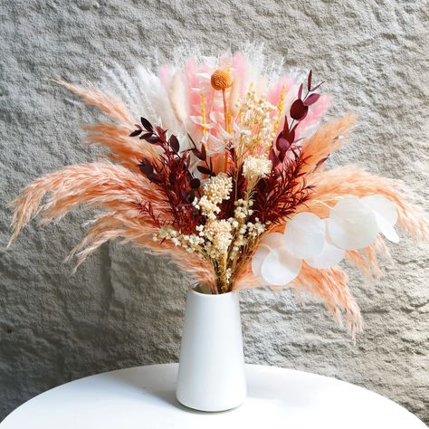 PRICES MAY VARY. Pink Decor: Pink Pampas bouquet decoration is a versatile home decoration, can be used in various Boho Home Decor, room Decor, bedroom Decor, office decoration,farmhouse decor Boho Home DECOR: dried pampas grass Ideal for a mantel, counter,dining table, coffee table or entrance stand display for creating a warm and inviting ambiance during the fall season Flower Arrangements for Every Occasion: Create centerpieces for baby shower,wedding,and party arrangement with pampas that ma Papas Grass Centerpiece, 70s Wedding Flowers, Pampas Grass Centerpiece Wedding Ideas, Floral Arrangements With Pampas, Pink Pampas Grass Decor, Fall Baby Shower Centerpieces, Boho Table Centerpieces, Pink Fall Decor, Pink Dried Flowers