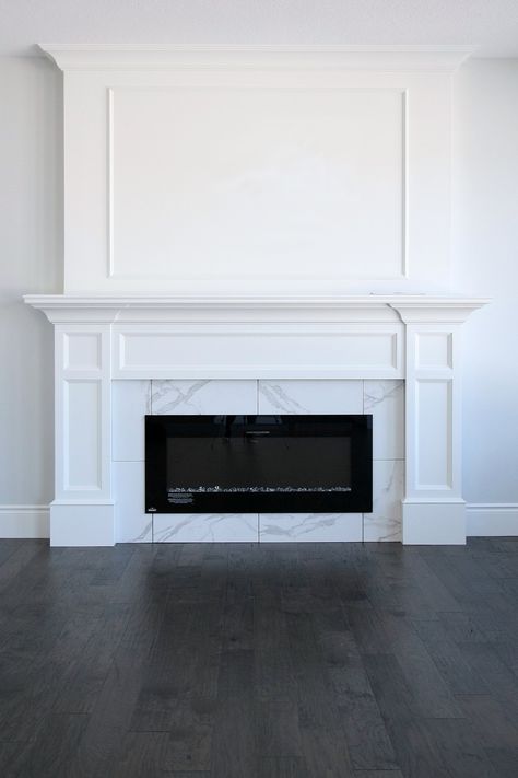 Transitional Fireplace Design Tile, Chloe Tile Fireplace, Fireplace Framing Plans, Rectangle Fireplace Ideas, Picture Frame Moulding Fireplace, Range Surround Ideas, Molding Over Fireplace, Modern Traditional Fireplace Ideas, Moulding Around Fireplace