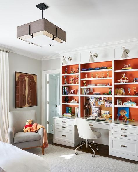 Boys bedroom designed with white and orange bookshelf built-in desk. Orange Bookshelves, Cushions Design, Leather Cushions, Orange Home, Boy Bedroom Design, Orange Home Decor, Bookcase Design, Orange Decor, Built In Desk