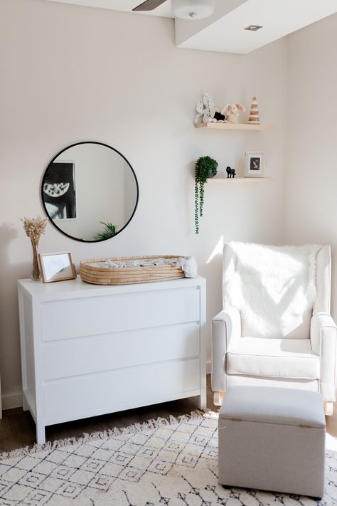 White compactum and neutral rocking chair Compactum Organisation, Compactum Nursery, White Nursery Chair, White And Timber Nursery, Neutral Baby Nursery Changing Tables, White Cot Nursery, White Baby Rocking Chair, Monochrome Nursery, Nursery Organization