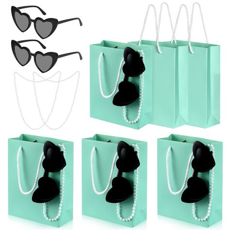 PRICES MAY VARY. 18 piece gift bag set：This value set comes with 6 Teal Blue Pieces paper party favor gift bags、6 Pieces white Pearl Necklace and 6 Pieces black Retro Heart Sunglasses.This set is perfect for parties and weddings, the pearl necklace and glasses add atmosphere and fun to the party. Size：The Teal Party Favor bags measures are 5.9x2.36x7.87inches,perfectly sized to hold party favors, candy, toys, goodies, treats and thank you gifts.The size of the pearl necklace is 6mm and the lengt Tiffany Blue Party Decorations, Tiffany Blue Party, Tiffany Themed Bridal Shower, Tiffany Birthday Party, Tiffany Birthday, Teal Party, Turquoise Party, Tiffany Theme, Tiffany Bridal Shower