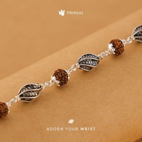 Feel the spirituality of Rudraksha and beautiful silver beads. Rudraksha Silver Marquise Beads Bracelet by Prinjal, Each Rudraksha bead holds spiritual significance, promoting positive energy and a sense of well-being. Shop this beautiful piece at www.prinjal.com Rudraksha Bracelet, Friendship Pictures, Gold Jewels Design, Clever Captions, Rudraksha Beads, Antique Gold Jewelry Indian, Har Mahadev, Beading Jewelery, Antique Gold Jewelry