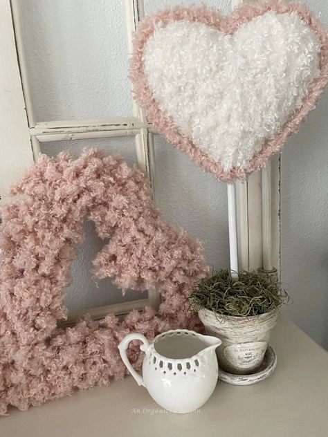 Do you love topiaries? I'm going to show you how to take a Dollar Tree styrofoam heart and turn it into a beautiful DIY topiary to decorate for Valentine's Day! Learn how to make a topiary using Teddy Bear yarn and a styrofoam heart. This is a simple DIY project so grab your glue gun and let's get started! Please pin this and follow us for more DIY and seasonal decor inspiration! Neutral Valentines Decor, Heart Topiary, Diy Topiary, Topiary Diy, Heart Craft, Tree Heart, Valentines Gift Guide, Heart Diy, Diy Valentines Decorations