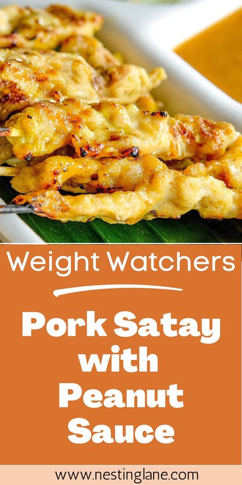 This Weight Watchers Pork Satay with Peanut Sauce recipe is a delicious and healthy way to satisfy your cravings. Tender pork tenderloin strips are marinated in a savory blend of soy sauce, brown sugar, and peanut butter before being skewered and broiled to perfection. The result is a mouth-watering dish that's high in protein and low in Points. The peanut dipping sauce, made with ginger, lime juice, and garlic, adds an flavor. This recipe is perfect for a weeknight dinner or weekend barbecue. Sauce For Pork Tenderloin, Tender Pork Tenderloin, Satay Sauce Recipe, Pork Satay, Peanut Dipping Sauce, Pork Sauce, Healthy Pork, Peanut Sauce Recipe, Peanut Dipping Sauces