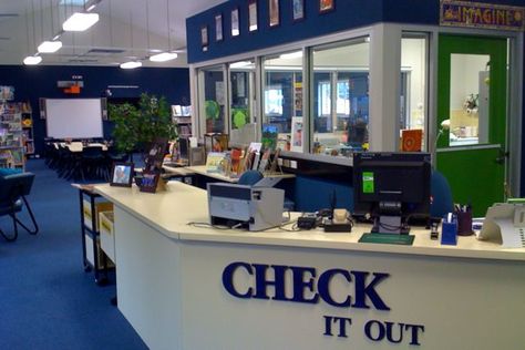 Check it out - again, 2010 | The MDF wooden lettering (from … | Flickr Library Circulation Desk, Circulation Desk, School Library Decor, Library Signage, Middle School Libraries, Library Media Center, Library Themes, Elementary School Library, Library Organization