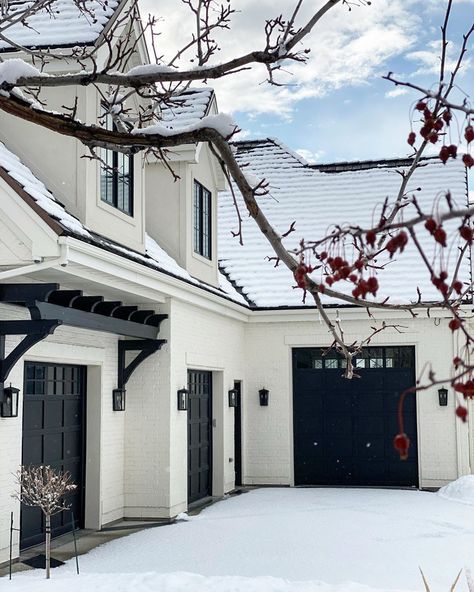 Mysha on Instagram: “❄️Snowy driveways and 🍒frosty berries! Happy Saturday my friends. You can find me inside trying to stay warm 👌🏻. . . #snowday #snowcovered…” Beautiful Garage, Black Garage Doors, Black Garage, Instagram Luxury, Modern Farmhouse Exterior, Casa Exterior, Painted Brick, Farmhouse Exterior, House Paint Exterior