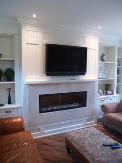 House of Fine Carpentry installed a feature wall around a fireplace insert with custom built in cabinetry. Horizontal Fireplace, Basement Fireplace, Fireplaces Ideas, Linear Fireplace, Fireplace Tv Wall, Fireplace Built Ins, Tv Wall Mount, Flat Screen Tv, Fire Places