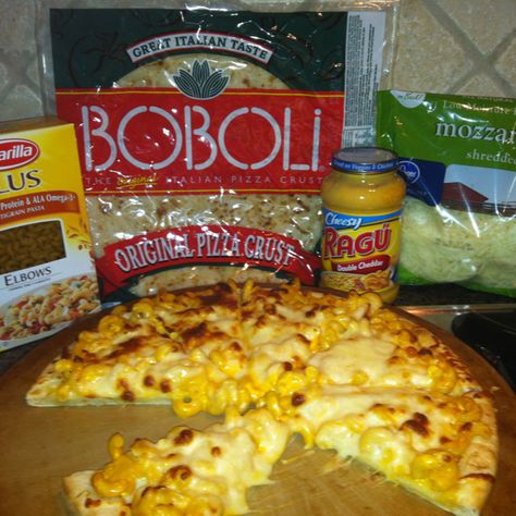 Mac N Cheese Pizza  My kids love Cici's Mac and Cheese Pizza so I decided to try making my own.  Ingredients: - Boboli Pizza Crust - 1cup uncooked elbow macaroni - 1/2 jar Ragu double cheese sauce - 2% skim shredded mozzarella  Cook macaroni according to package directions. Drain and return to pan.  Mix in cheese sauce thoroughly. Spread evenly over Boboli crust. Top with mozzarella cheese. Bake at 450 for 8-10 min. Cut and serve. Boboli Pizza Crust, Macaroni And Cheese Pizza, Mac N Cheese Pizza, Boboli Pizza, Boboli Pizza Recipes, Pillsbury Pizza, Mac And Cheese Pizza, Cheese Pizza Recipe, Cheese Packaging