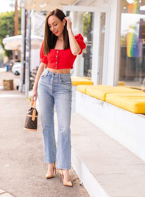 Sydne Style shows july 4th outfit ideas in red top and jeans #croptop  #highwaist #louboutin #puffsleeve @sydnesummer Stylish Crop Tops On Jeans, High Waisted Pants And Crop Top Casual, What To Wear With A Red Top, Crop Top On Jeans, Red And Jeans Outfits, Red Top Jeans Outfit, Party Wear Jeans Top Outfit, Poses In Crop Top And Jeans, Jeans Top Outfit For Women