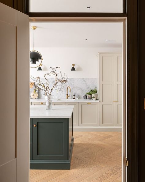 We love this kitchen/diner and utility room project which has been designed using our bespoke Shaker range. The classic off-white… | Instagram Shaker Kitchen With Island, Light Kitchen Colors, Shaker Kitchen Island, Green Shaker Kitchen, Modern Shaker Kitchen, White Fridges, Neutral Kitchen, Wardrobe Furniture, Built In Ovens