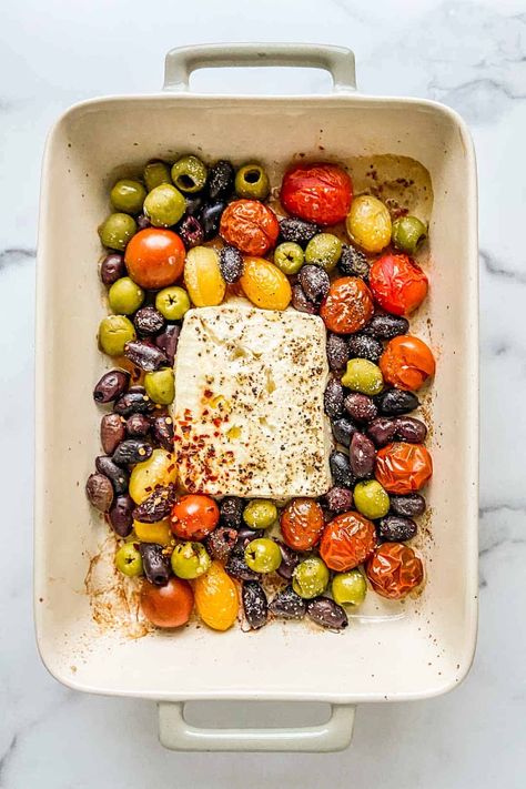 This delicious baked feta appetizer with roasted olives and tomatoes is a huge hit at dinner parties! Roasted Olives And Whipped Feta, Healthy Christmas Appetizers, Baked Feta Appetizer, Baked Feta With Olives, Feta With Olives, Feta Appetizer, Sunday Snacks, Thanksgiving Appetizers Healthy, Turkey Appetizers