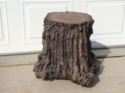 Faux Tree Stump stool (upside-down bucket covered with spray foam, topped with wooden board then painted and highlighted in browns.) Tree Stump Stool, Spray Foam Tree, Stump Stool, Shrek Jr, Play Props, Decoration Vitrine, Tree Stumps, Sale Furniture, Elegant Garden