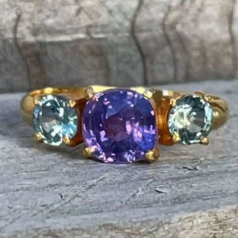 Stone Jewellery Designs, Trinity Ring, Green Sapphire Ring, Trilogy Ring, Blue Green Sapphires, Natural Gemstone Ring, Purple Sapphire, Live In The Present, Orange Sapphire