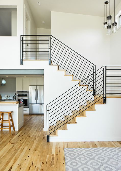 Modern staircase in a classic u-shape, or scissor, style. #staircase #modernhome U Shaped Stairs, U Shaped Staircase, Contemporary Mountain Home, Jackson Hole Wy, Stairs In Living Room, Open Staircase, Stairs Design Modern, Metal Railings, Home Stairs Design