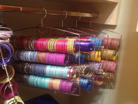 Organize your many Indian bangles in your closet using trouser hangers. #closet #organization #Indian #bangles Indian Jewelry Storage, Indian Jewelry Organization, Bangle Organizer Ideas, Saree Organization In Closet, Indian Closet Organization, Bangles Organizer, Bangle Storage Ideas, Bangle Storage Ideas In Wardrobe, Bangles Stand