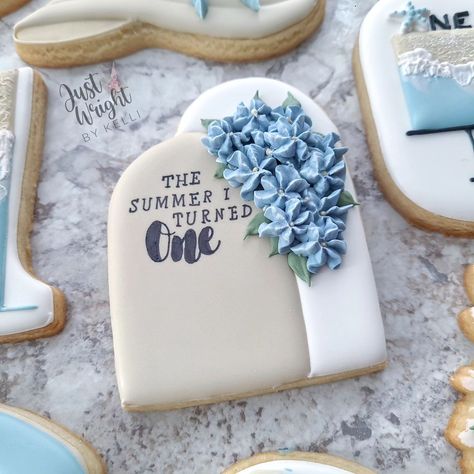 The Summer I Turned One! Swooning over this first birthday set. Beachy vibes and blue hydrangeas....need I say more? I truly hope Lily enjoyed her first birthday as much as I enjoyed making her cookies 🌊🐚. Which design is your favorite? I'm still deciding 😁 . . . #beachyvibes #beachset #decoratedsugarcookies #hydrangeas #umbrellacookies #thesummeriturnedpretty #seashells #sunhat #nhsugarcookies #nhlocal #merrimackbaker #southernnh #sugarcookieart #beachcookies #beachwaves #birthdaytheme... First Birthday Cookies, Beach Cookies, Her First Birthday, Blue Hydrangeas, Beachy Vibes, Cookie Art, Birthday Cookies, Blue Hydrangea, Sugar Cookies Decorated