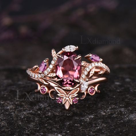 Item description ✦ Handmade, high-quality item! ✦ Material: Solid 10k/14K/18K GOLD (can be made in white/rose/yellow gold) Engagement ring ✦ Center stone: Natural Pink Tourmaline ✦ Size/Weight: 6x8mm Oval Cut ✦ Side stones: Marquise Cut Natural Pink Tourmalines and Marquise Cut/Round Cut Moissanites Wedding bands ✦ Gemstones: Round Cut Natural Pink Tourmalines Any ring size can be made,if the ring size is not in the option list ,contact me. As it is handmade,it needs 2-4 weeks to finish and then be shipped by usps or DHL. Return policy: We offer 30 days return policy. For any reason, if you are not completely satisfied with your order, you may return it for a refund.  Buyer is responsible for the handcraft fee (15%-30% of the total price) and the return shipping cost. Tourmaline Wedding Ring, Pink Engagement Ring Set, Wedding Rings For Bride Pink Tourmaline, Pink Goth Wedding Ring, Pink Amethyst Ring For Wedding, Fine Jewelry Style, Pink Tourmaline Rings With Gemstone Accents, Morganite Wedding Set, Luxury Pink Tourmaline Rings, Pink Tourmaline Engagement Ring