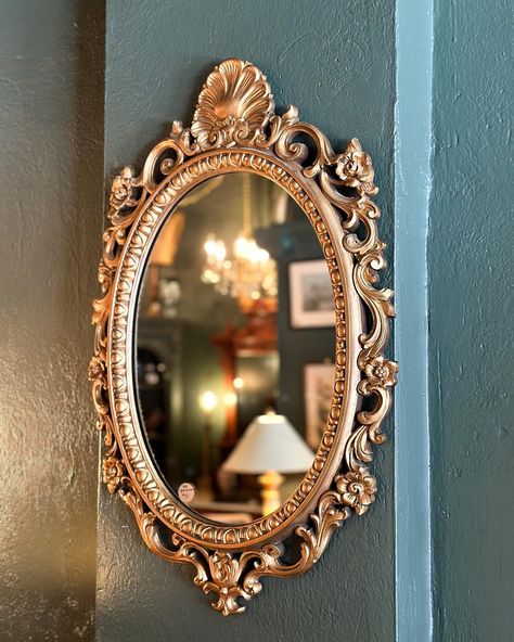 𝐀𝐕𝐀𝐈𝐋𝐀𝐁𝐋𝐄— Vintage Ornate Gold Mirror Gorgeous gold mirror with an ornate floral design and shell accent at the top. The frame is made of a thick plastic. Very light & easy to hang! In excellent condition with very minor wear due to age. No cloudiness or desilvering on the mirror. 19”w x 29”t $70 This piece can be seen in store while still available. Pick up or nationwide shipping. Dm to purchase or get a shipping quote! _________ #vintagefurniture #vintagefurnitureforsale #vintagestore... Ornamental Mirror, Ornate Gold Mirror, Academia Decor, Gilded Mirror, Dark Academia Decor, Vintage Mirror, Gold Mirror, Vintage Store, The Mirror