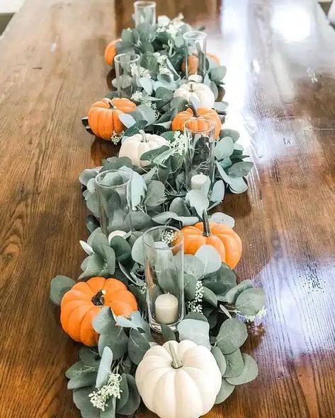 28 Fall Centerpiece Ideas to Make Your Table Instagram-Worthy Fall Decor With Eucalyptus, Eucalyptus And Pumpkin Centerpiece, Pumpkin And Greenery Table Decor, Eucalyptus Fall Garland, Fall Wedding Centerpieces With Pumpkins Wedding Table Decor, Eucalyptus Fall Centerpiece, Fall Garland Centerpiece, My Little Pumpkin Baby Shower Table Decor, Fall Eucalyptus Centerpiece