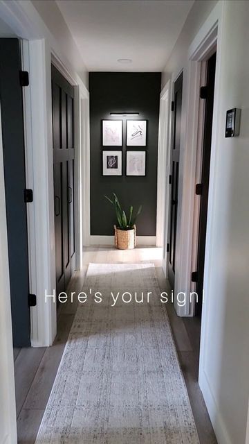 Dark Wall End Of Hallway, How To Make A Short Hallway Look Longer, Black Hallway Decor, Painting A Hallway Ideas, Painting A Hallway, Entry Way Renovation, Painted Hallway Doors Interior, Black Entryway Door, Behind Front Door Decor Entryway