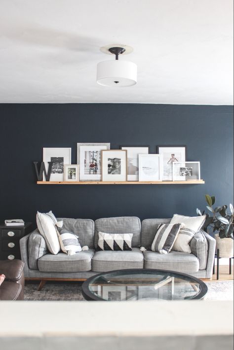 Living Room With Navy Walls, Living Room Designs Wall Color, Navy Grey And Wood Living Room, Living Room One Wall Painted, Grey Couch Blue Walls Living Room Ideas, Color To Paint Living Room Ideas, Navy Tv Room, Cozy Navy Living Room, Navy Living Room Accent Wall