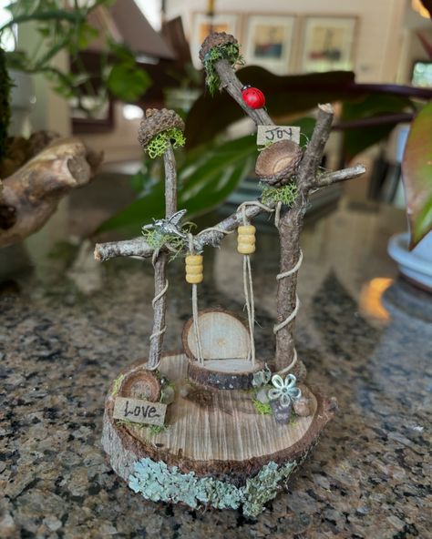 Tiny little swing ❤️ • • #tinyswing #fairyswing #fairygarden #fairygardens #fairygardensofinstagram #fairygardenideas #fairygardening #fairygardenaccessories Diy Fairy Garden Accessories Handmade, Fairy Wheelbarrow, Arbor Bench, Fairies Garden, Fairy Homes, Wood Pile, Fairy Garden Crafts, Fairy Furniture, Faeries Gardens