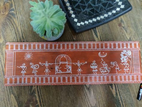 Warli art on wooden plank Warli Art On Wooden Tray, Painting On Wooden Planks, Warli Painting, Handpainted Tote Bags, Warli Art, Wooden Plank, Wooden Planks, Wooden Tray, Wooden Table