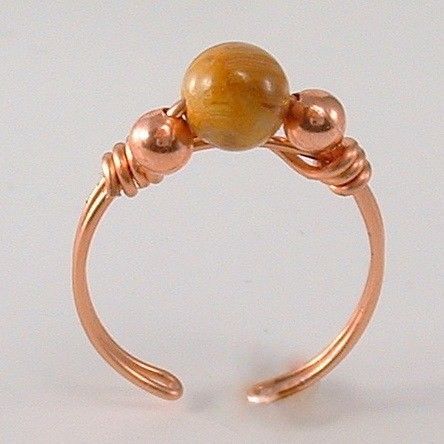 Adjustable Yellow Crazy Lace Agate Copper Wire Ring | healingcrystaljewelry - Jewelry on ArtFire: Copper Wire Ring, Stonington Gray, Wire Jewelry Rings, Diy Jewelry Rings, Bijoux Fil Aluminium, Wire Jewelry Tutorial, Jewelry Hanger, Wire Ring, Healing Crystal Jewelry