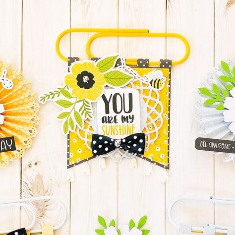 Stephanie on Instagram: "Hey friends! Today I’m  sharing a project using KScraft’s jumbo paper clip banner die. What a fun idea for those jumbo clips! 🐝🐝🐝

#kscrafts #kscraft_hannah #kscraftdies #diecutting #jumbopaperclips #paperbanners #happybees #echoparkpaper #echoparkpaperco #beehappycollection #patternpaper #happycrafting #papercrafts #paperprojects #papercraftingfun #papercraftsofinstagram #craftsoninstagram #diyembellishments #handmadecards #makestuff #paperfun #paperandglue #honeybeecrafts" Paper Clips Ideas, Echo Park Paper, Paper Banners, Bee Crafts, Echo Park, Bee Happy, Paper Clips, Paper Projects, Paper Clip