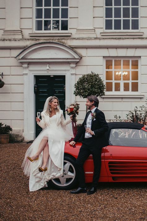 Bride and groom with champagne glasses in front of a red Ferrari with rose bouquet Ferrari Wedding Car, Gardenia Wedding, Luxury Blazer, Wedding Transport, Short Wedding Gowns, Wedding Dress Photography, Vintage Car Wedding, Red Ferrari, Wedding Dress Brands