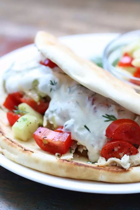 Greek Chicken Gyros (Instant Pot or Crockpot) - 365 Days of Slow Cooking and Pressure Cooking Greek Chicken Pita, Greek Chicken Gyros, Chicken Pita, Chicken Gyros, Pressure Cooker Chicken, Easy Baked Chicken, Chicken Slow Cooker Recipes, Greek Chicken, Instant Pot Pressure Cooker