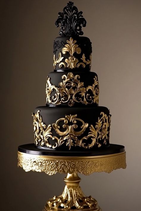 Elegant black and gold tiered cake with ornate baroque decorations on a matching stand. Black And Gold Cake Ideas, Gold Cake Ideas, Victorian Wedding Cakes, Gold Cakes, Gothic Wedding Cake, Gold Fondant, Victorian Gothic Wedding, Black And Gold Cake, Fondant Ruffles