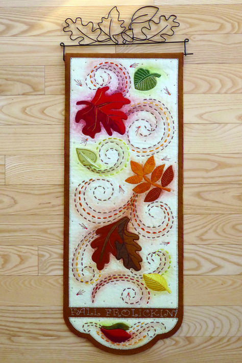 Wool applique wall hanging for Autumn. Fall Frolickin' Quilt Pattern DBM-024 by Design And Be Mary - Mary Mittelstadt.  Check out our applique quilt patterns. https://www.pinterest.com/quiltwomancom/applique-quilt-patterns/  Subscribe to our mailing list for updates on new patterns and sales! https://visitor.constantcontact.com/manage/optin?v=001nInsvTYVCuDEFMt6NnF5AZm5OdNtzij2ua4k-qgFIzX6B22GyGeBWSrTG2Of_W0RDlB-QaVpNqTrhbz9y39jbLrD2dlEPkoHf_P3E6E5nBNVQNAEUs-xVA%3D%3D Seasonal Wall Hangings, Applique Wall Hanging, Wall Hanging Pattern, Paint Sticks, Cottage Quilt, Applique Quilt Patterns, Wool Projects, Painted Sticks, Wool Applique