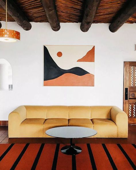 14 Colors That Go Blissfully With Mustard Yellow | Hunker Pueblo Revival, Santa Fe Style, Décor Boho, Local Design, Wood Burning Fireplace, New Wall, Santa Fe, The Wall, Contemporary Rug