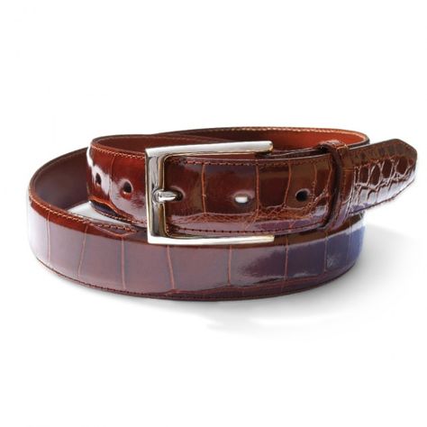 Our belts are the finest quality you can get, made from Genuine American Alligator. Available with choice of polished nickel or brass buckle. The ultimate exotic mens accessory - finish and scale pattern will vary from image. Additional sizes available for special order, allow 2-3 weeks delivery. Call for pricing. Genuine American Alligator Made in USA Matching calfskin leather liner Width: 32mm / 1.25 inches Usually ships in 2 business days Alligator Wallet, Well Dressed Man, Crocodile Leather Belt, Alligator Belt, American Alligator, Men Belts, Belt Men, Scale Pattern, Best Wallet