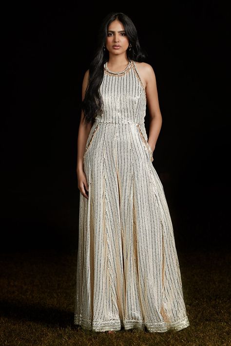 Shop for these amazing collections of Ivory Georgette Embroidered Sequins Halter Neck Flared Jumpsuit For Women by Basanti - Kapde Aur Koffee online at Aza Fashions. Indian Jumpsuit Outfit, Indian Jumpsuit, Flared Jumpsuit, Embroidered Jumpsuit, Jumpsuit For Women, Sequin Halter, Flare Jumpsuit, Tarun Tahiliani, Jumpsuit Pattern