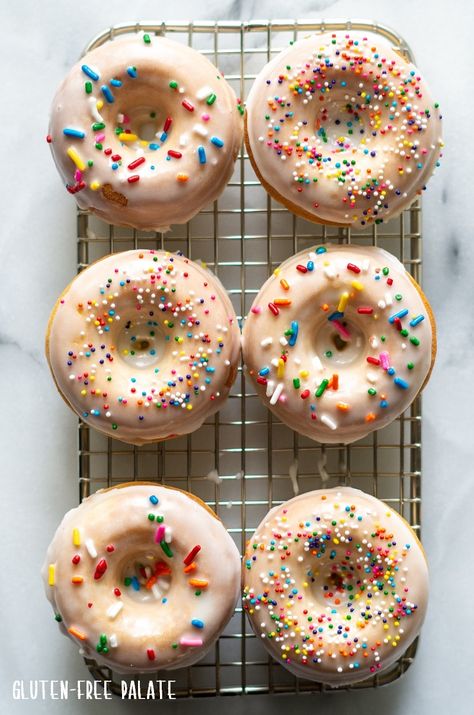 Fun and festive Gluten-Free Vanilla Donuts that are soft, bursting with vanilla, and smothered in a sweet glaze. Enjoy these gluten-free vanilla donuts plain or top them with sprinkles for an extra colorful treat. Nut Free Treats, Beignets Cuits, Gluten Free Donut Recipe, Gluten Free Vanilla Cake, Gluten Free Brunch, Cake Doughnuts, Low Sugar Snacks, Sweet Glaze, Gf Breakfast