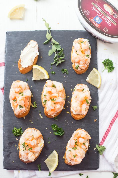 Shrimp Scampi Crostini - This shrimp scampi crostini is the perfect addition to your holiday party menu or even for game day! It's simple, it's elegant, and it has the perfect butter, lemon, garlic ratio! Impress your guests with incredibly flavorful and easy crostini. Shrimp Crostini, Seafood Christmas, Easy Crostini, Holiday Party Menu, Crostini Appetizers, Cocktail Appetizers, Creole Recipes, Shrimp Scampi, Dinner Appetizers