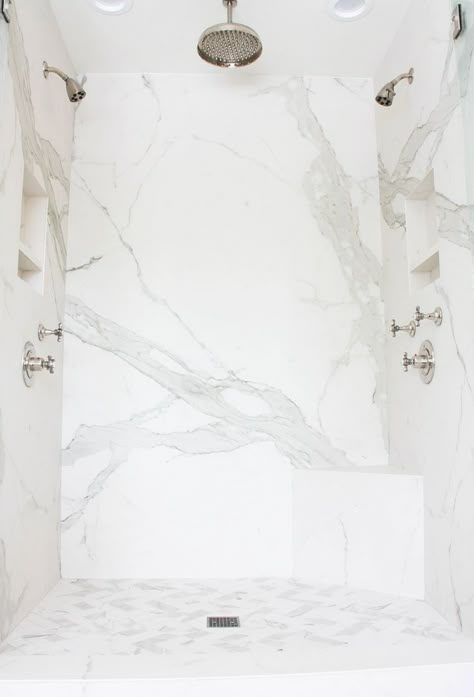 solid surface shower walls with grout-free wall panels made of porcelain shower slabs Shower Dimensions, Double Shower Heads, House Renovation Projects, Master Bath Shower, Marble Showers, Shower Wall Panels, Shower Floor Tile, Double Shower, Master Shower