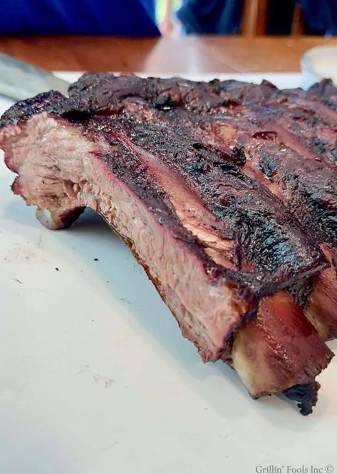 Grilled Beef Back Ribs | GrillinFools Beef Back Ribs Grilled, Beef Ribs On The Grill, Beef Back Ribs Recipe, Charcoal Grill Recipes, Ribs On The Grill, Grilled Beef Ribs, Ribs Seasoning, Back Ribs Recipe, Beef Back Ribs