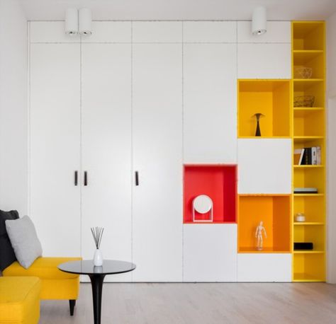 Make Small Rooms Look Bigger, Bedroom Reference, Small Space Look Bigger, Small Room Look Bigger, Orange Shelves, Hidden Shelves, Entrance Room, Colorful Shelf, Room Look Bigger