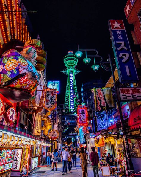 Did you know that Shinsekai (新世界, lit. ""New World"") is one of Osaka's most interesting neighborhoods. This area has remained largely untouched over the years. At the center of the district stands Tsutenkaku Tower, the nostalgia-evoking symbol of Shinsekai. ⁣⁣ 📷 oli_historian_traveler⁣⁣ Photos Of Japan, Osaka Travel, Japan Bucket List, Japan Destinations, Japan Guide, Tokyo City, Trip To Japan, Cyberpunk City, Japan Culture