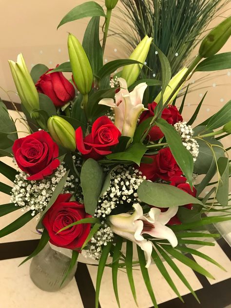 An amazing flower bouquet of Red Roses, Lillies and baby’s breath. Rose And Lily Bouquet, Lily Bouquet, Red Rose Flower, Baby S Breath, Beautiful Butterflies, Amazing Flowers, Rose Flower, Flowers Bouquet, Red Roses